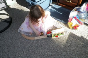 Echo got her sun in the sunroom with the train set