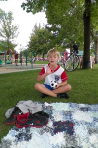 Aidan with his belated (way) birthday present... I made him a soccer ball, he just happened to be wearing his jersey!