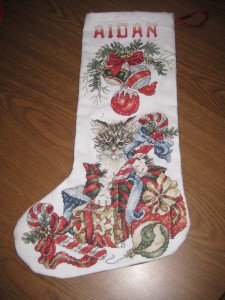 Stocking done up for Aidan N. I do not do stockings like these on commission. The time spent stitching is just too extreme. Though I WILL do ones of my own design. Fee is dependant on whether or not stocking is to be delivered completely finished and complexity of design and will cost more than a general commission. 